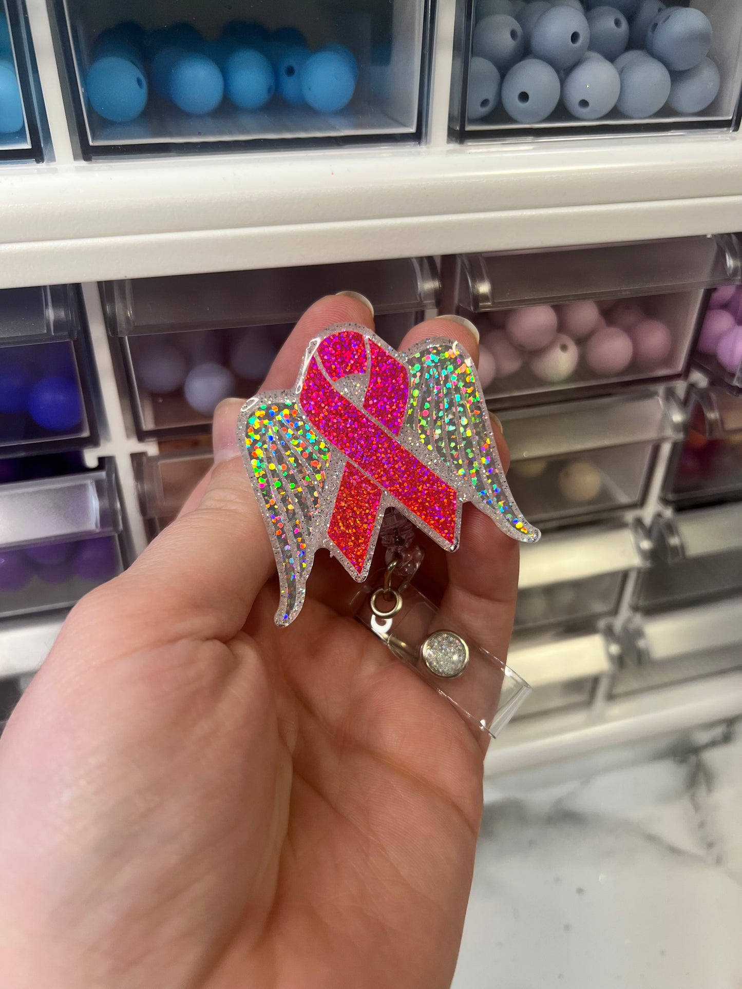 Cancer Ribbon with Wings Badge Reel