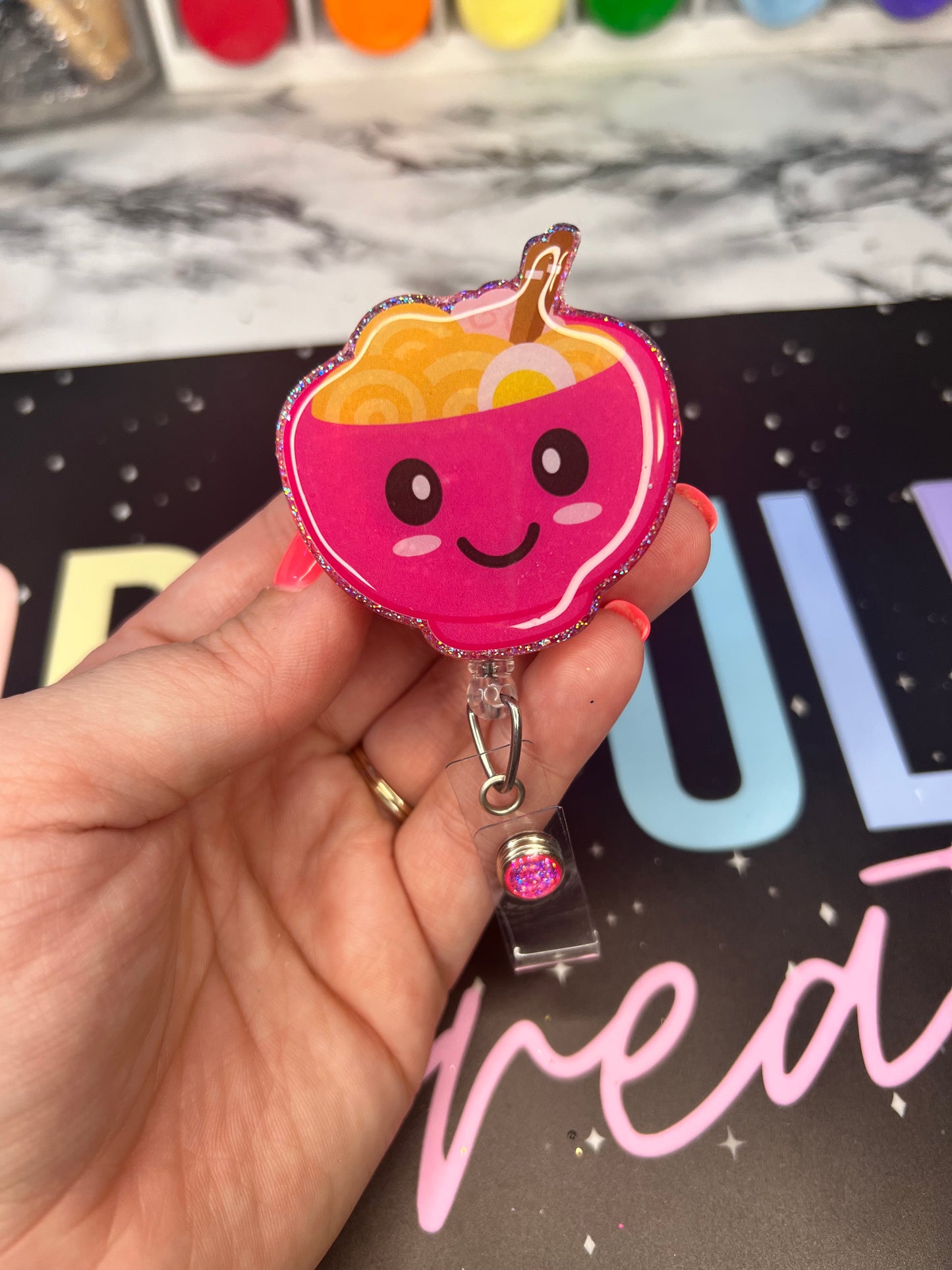 Noodles Badge Reel