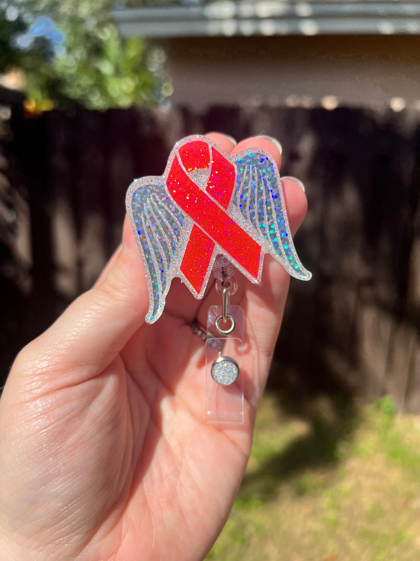 Cancer Ribbon with Wings Badge Reel