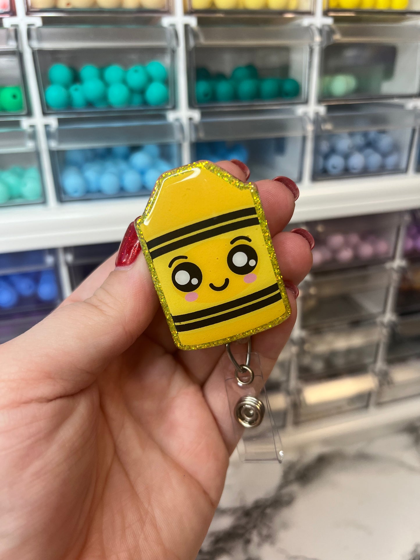 Yellow Crayon Badge Reel