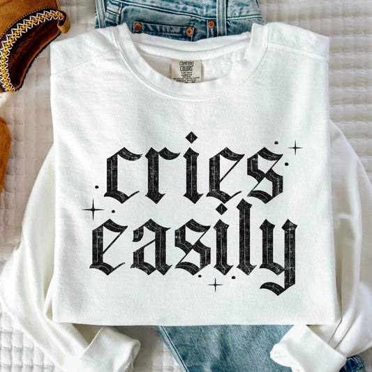 CRIES EASILY