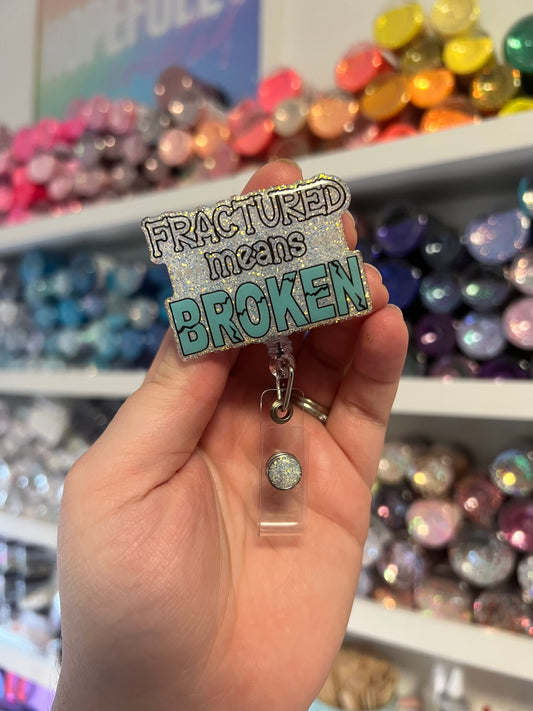 Fractured means Broken Badge Reel